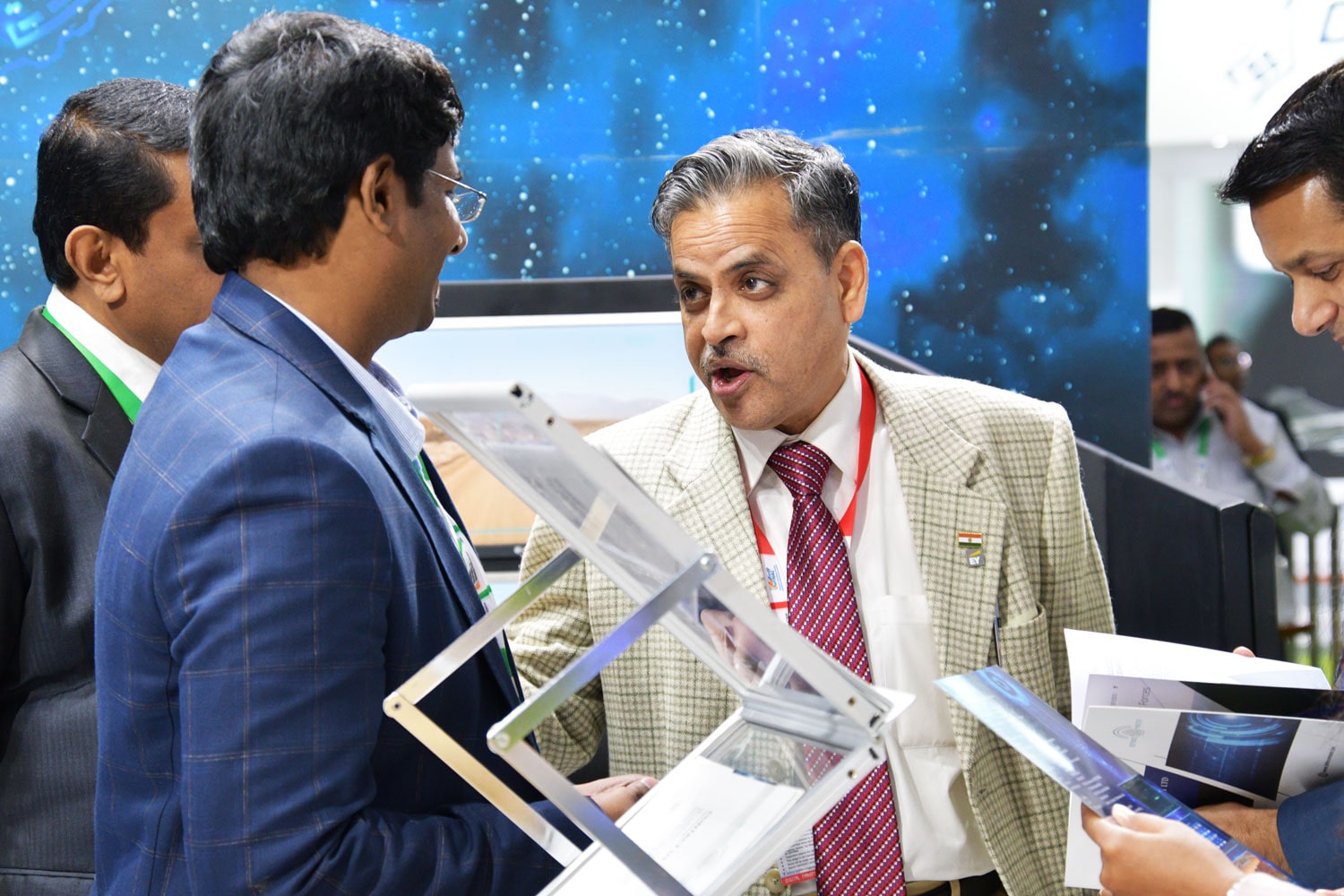 International Business visitors are impressed seeing the India’s Unmanned Armoured Vehicle SOORAN displayed by Defence Master
