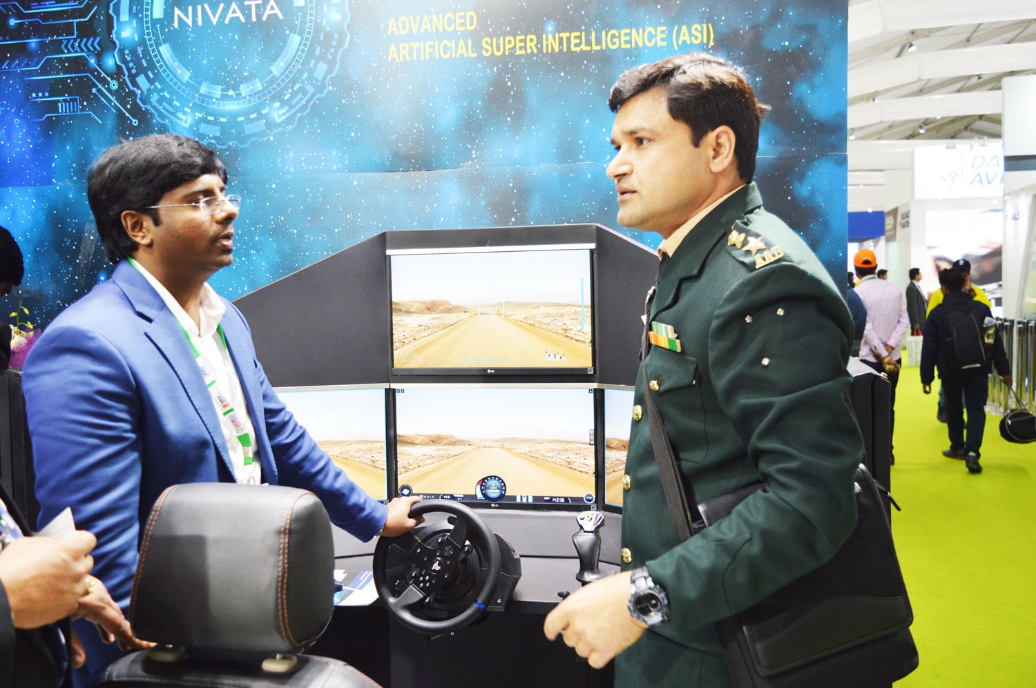 International Business visitors are impressed seeing the India’s Unmanned Armoured Vehicle SOORAN displayed by Defence Master