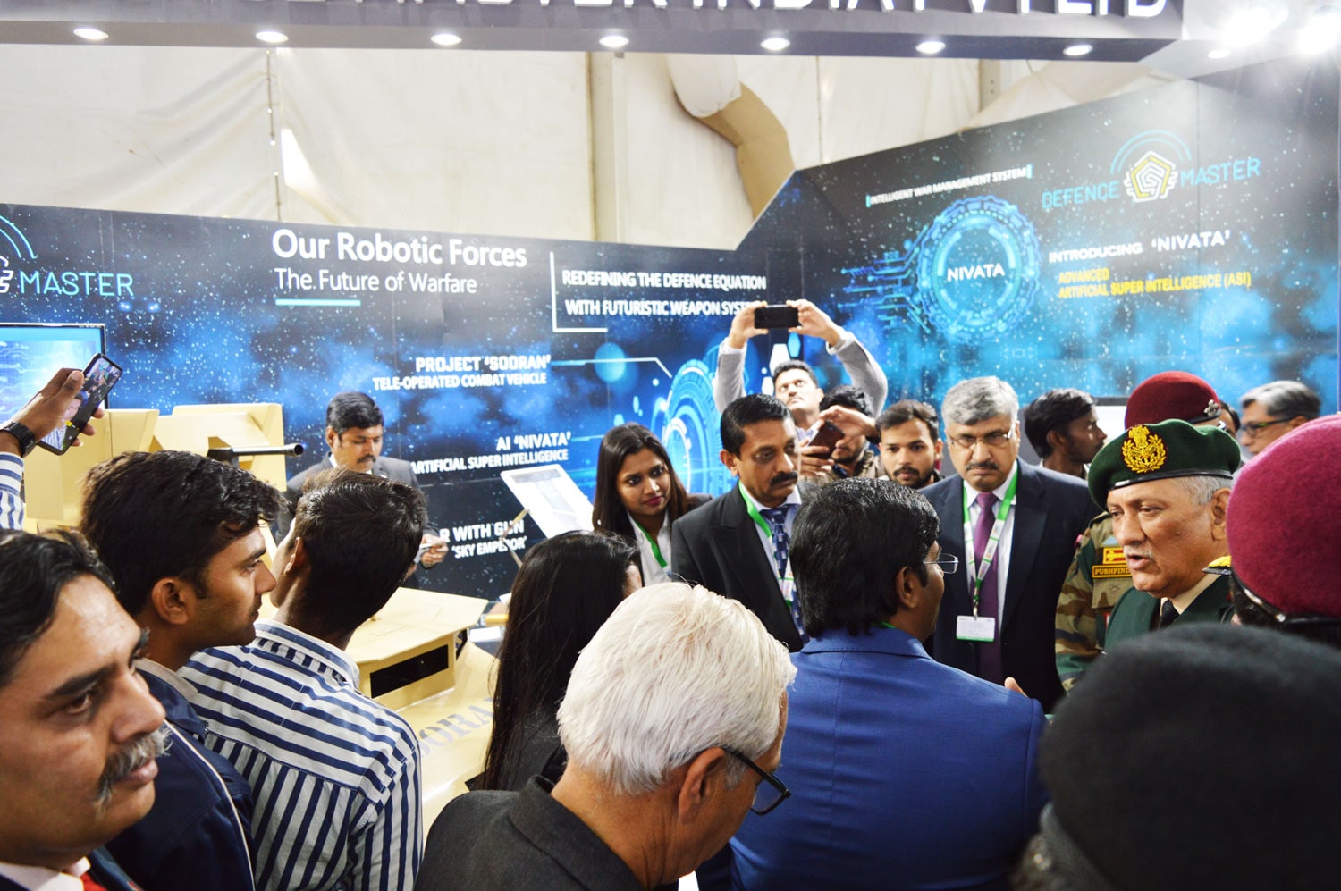 Chief of Defence Gen. Bipin Rawat fascinated seeing the Armoured UGV SOORAN displayed by Defence Master at DEFEXPO, Lucknow