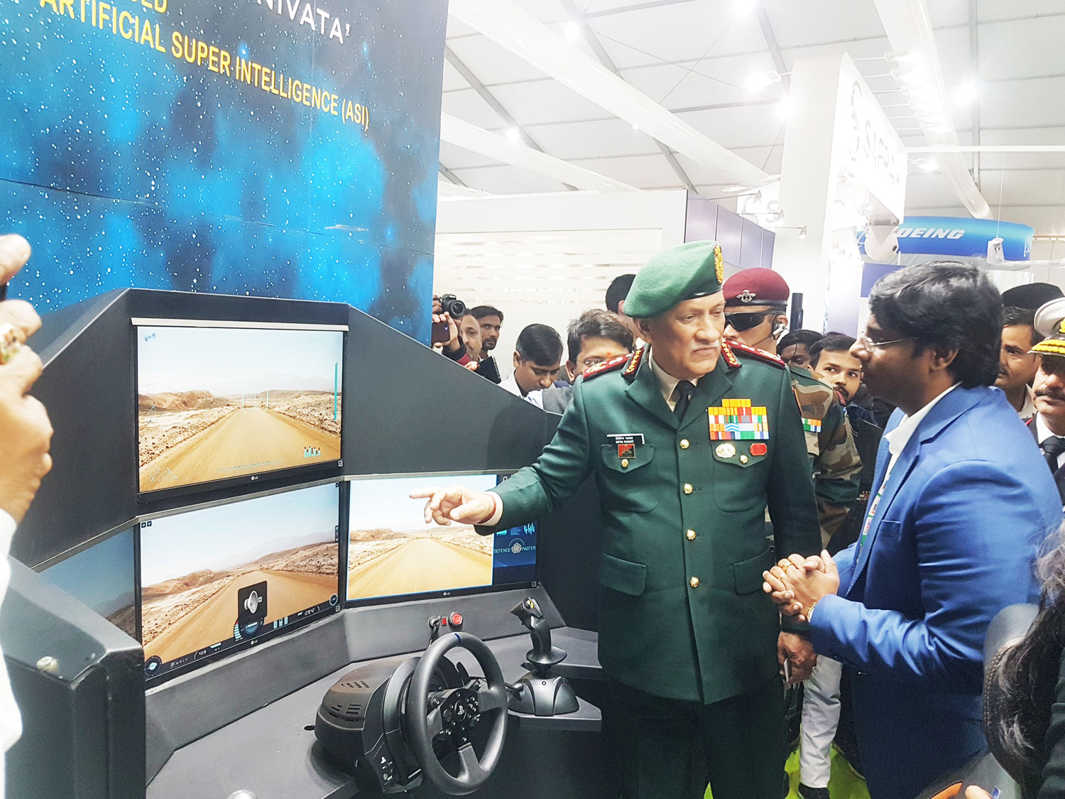 Chief of Defence Gen. Bipin Rawat fascinated seeing the Armoured UGV SOORAN displayed by Defence Master at DEFEXPO, Lucknow